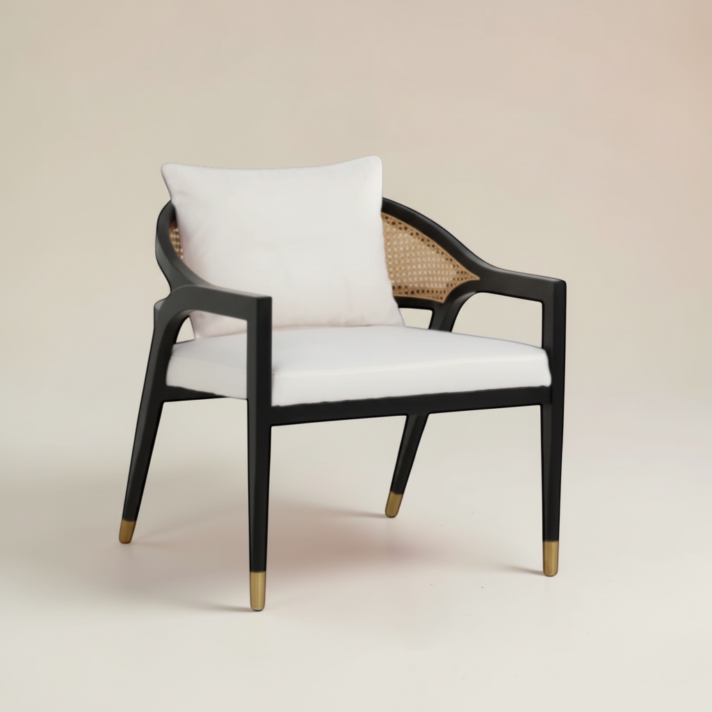 Trộm vía Kai armchair with black ash wood frame, rattan back, and removable crème cushion. Modern accent chair.